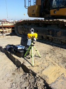 HoistCam HC160 Mounted on Tripod next to Excavator with Transport Case